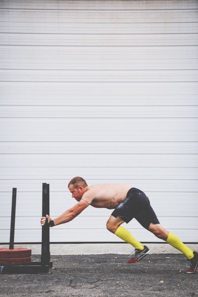 yellow compression sports socks on athlete